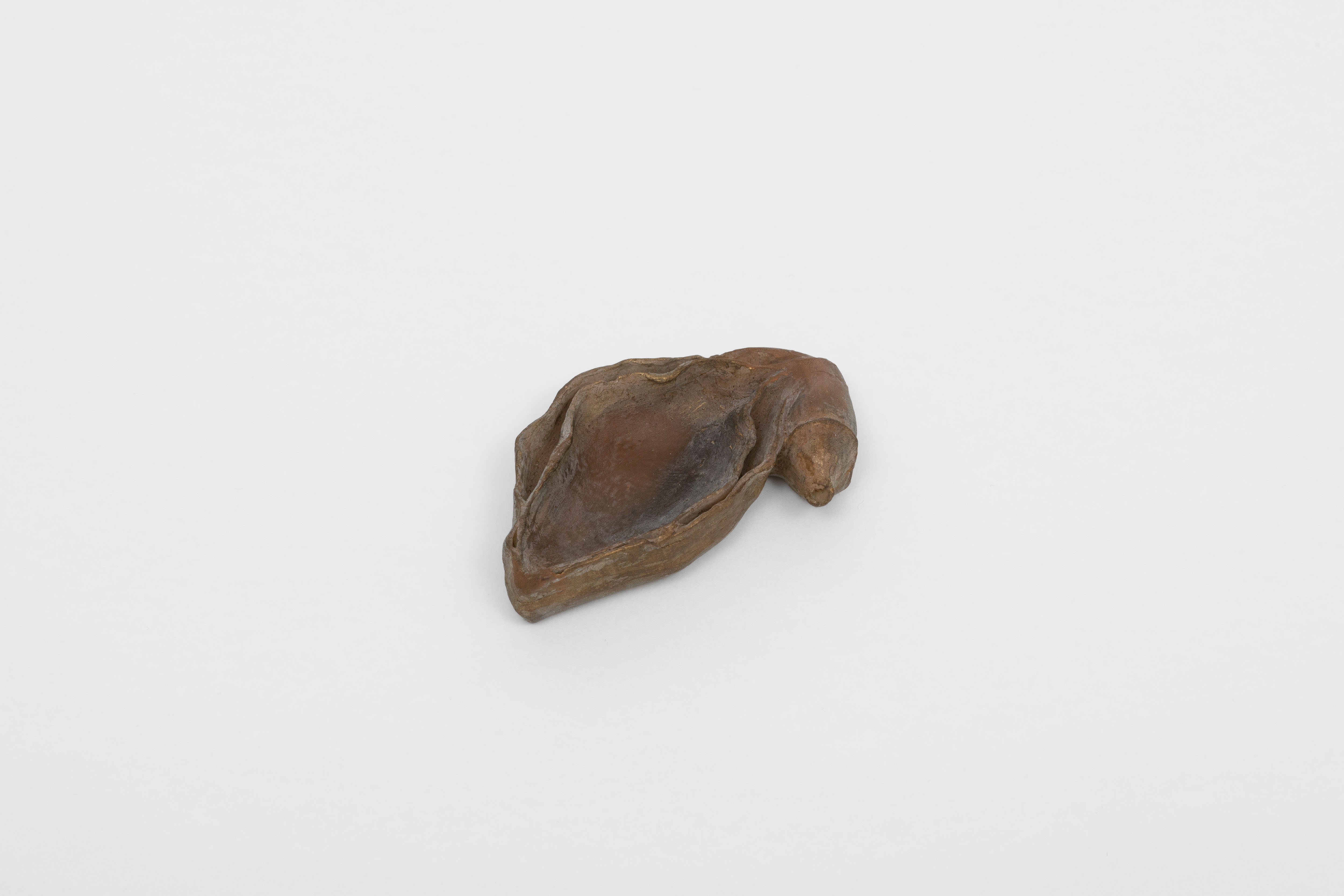 <p>Vulva and penis cosmetic dish, or offering spoon</p>