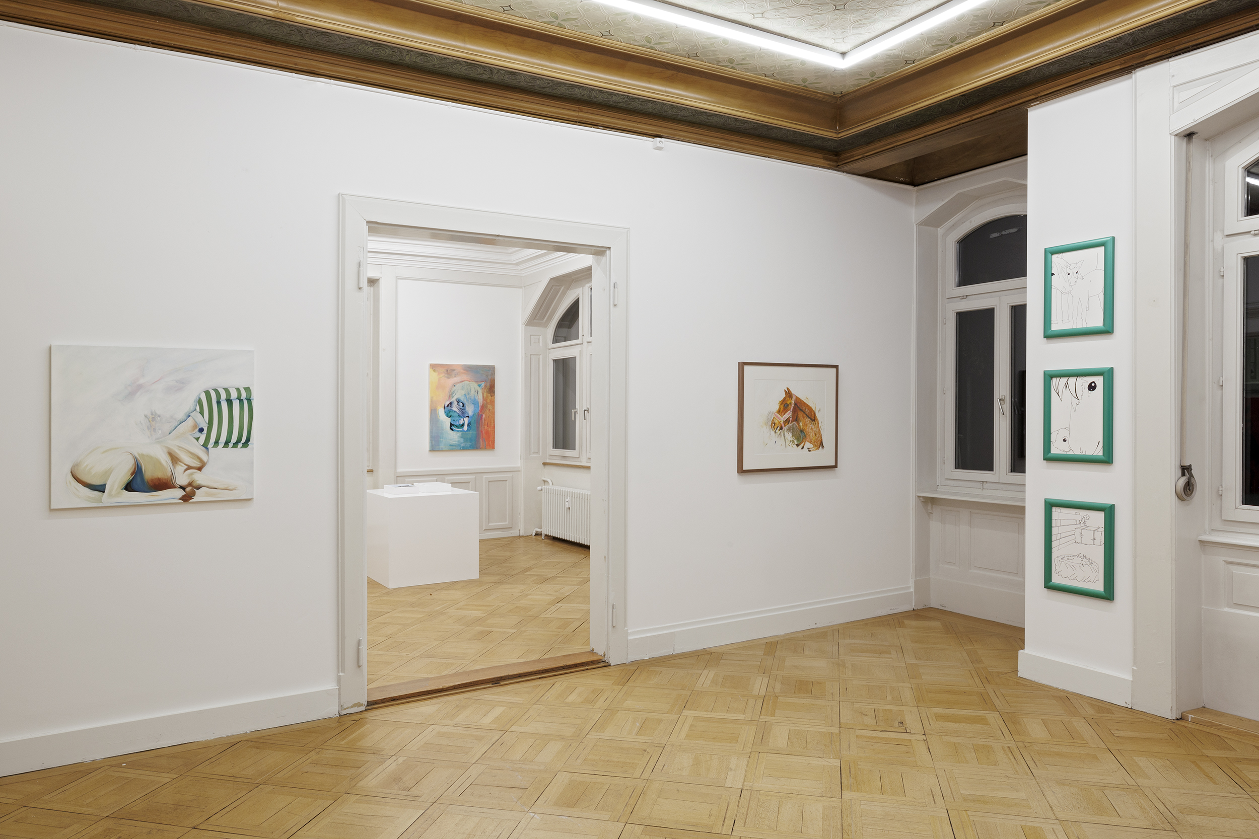 <p><em>Kühe und Pferde</em></p>